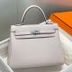 Hermes Kelly 25cm Retourne Bag In Mauve Pale Clemence Leather