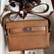 Hermes Kelly Messenger PM Bag in Gold Evercolor Leather