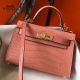 Hermes Kelly Mini II Handmade Bag In Pink Crocodile Embossed Leather